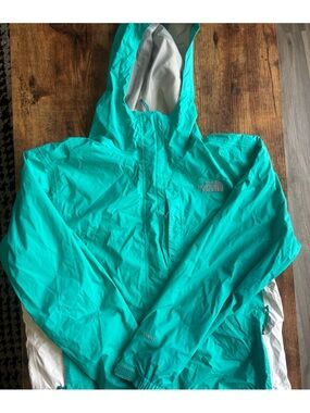 The North Face Women's Teal Raincoat. Size Large.